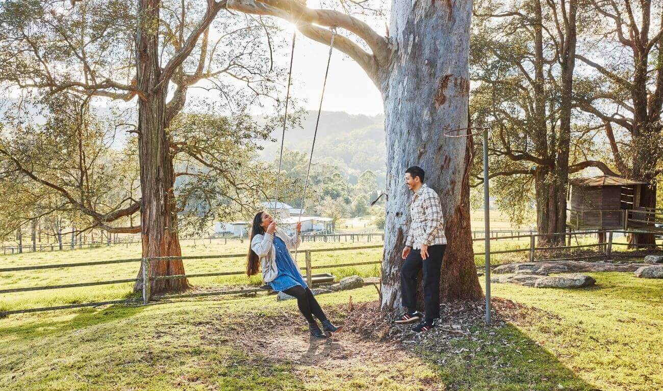 couple enjoying farmstay experience outdoors